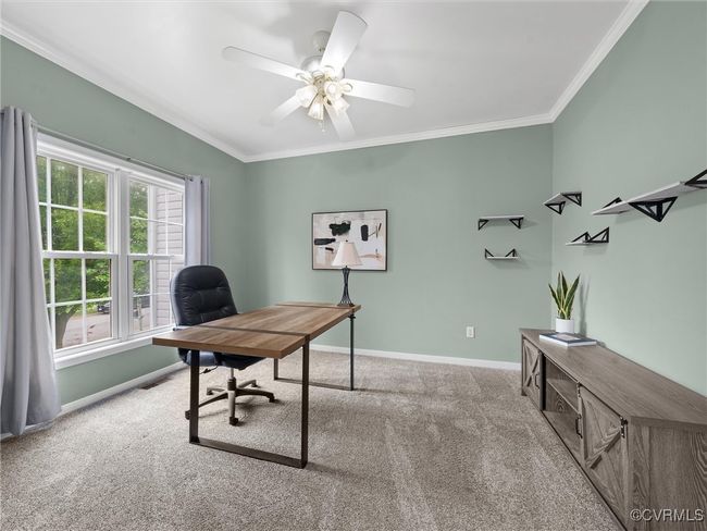 Home office with carpet, crown molding, and ceiling fan | Image 14