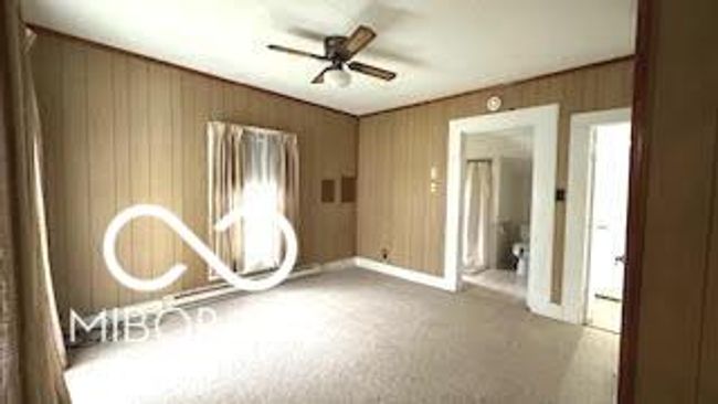 Bedroom with adjoining walk in closet and bath | Image 11