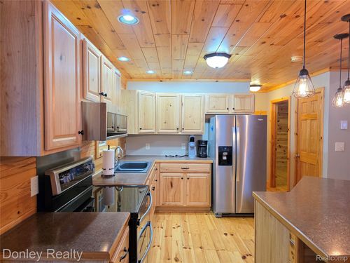 8854 Dellwood Dr, Elmira, MI, 49730-9455 | Card Image