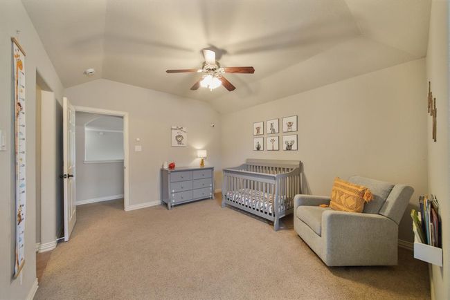 A view of the fifth bedroom with the corridor in the background. | Image 41