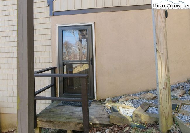 Exterior entrance (private entrance) to lower bedroom/ separate suite | Image 42