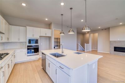 8610 Big Thompson Street, House other with 4 bedrooms, 2 bathrooms and 3 parking in Littleton CO | Image 3