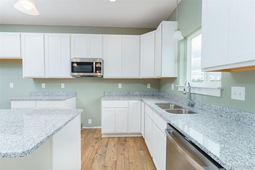 570 W Wildwood Dr, Owosso, MI, 48867-9119 | Card Image