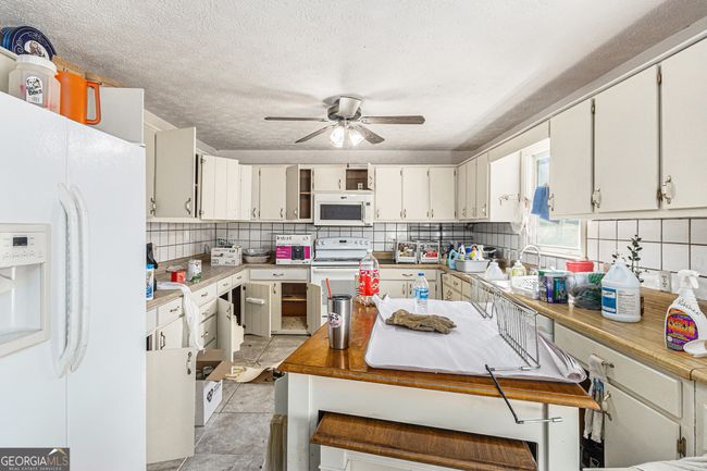 290 Lyons Bridge Rd Sw, House other with 4 bedrooms, 2 bathrooms and 4 parking in Lindale GA | Image 8