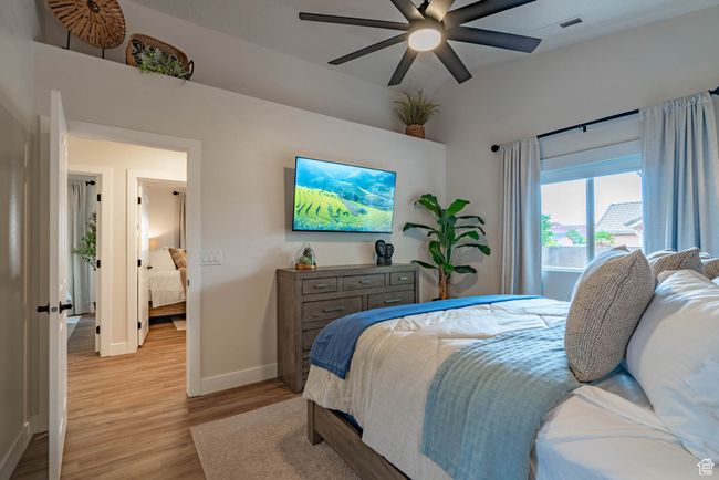 Bedroom with ceiling fan and light hardwood / wood-style floors | Image 35