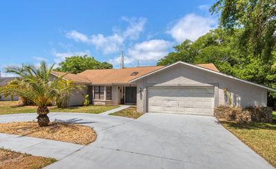 209 Normandy Circle W, House other with 4 bedrooms, 3 bathrooms and null parking in Palm Harbor FL | Image 2