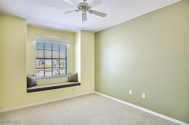 Carpeted spare room with ceiling fan | Image 39