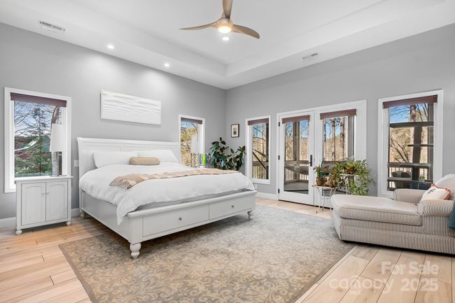 Primary Suite with Tray Ceilings, French Doors to screened porch and spa bathroom | Image 17