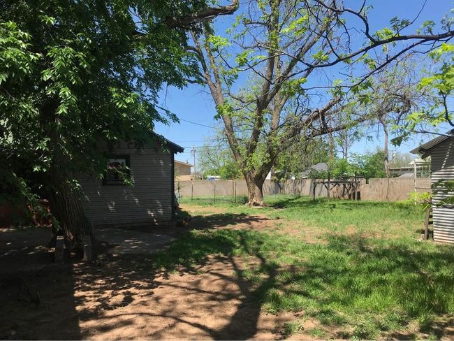 View of yard featuring fence | Image 16