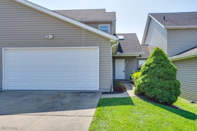 View of front facade with a front lawn | Image 1