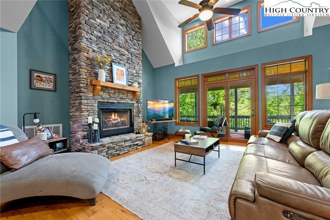 Living Room with Stacked Stone Natural Gas Fireplace | Image 5