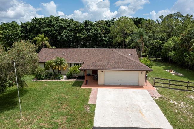 15429 Temple Blvd, House other with 3 bedrooms, 2 bathrooms and null parking in Loxahatchee FL | Image 56