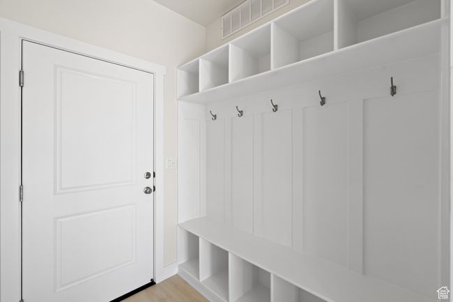 Mudroom featuring light wood-type flooring | Image 13