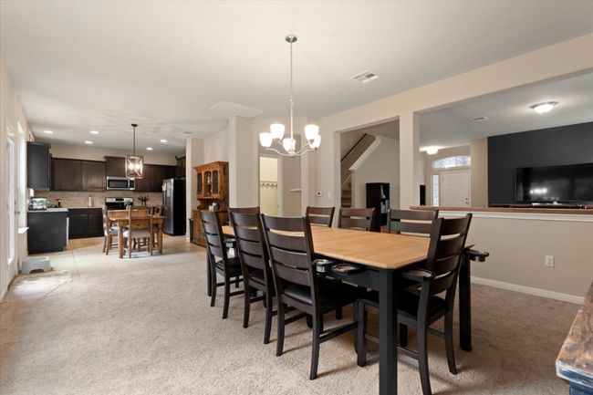 Open concept floor plan in the downstairs area. | Image 11