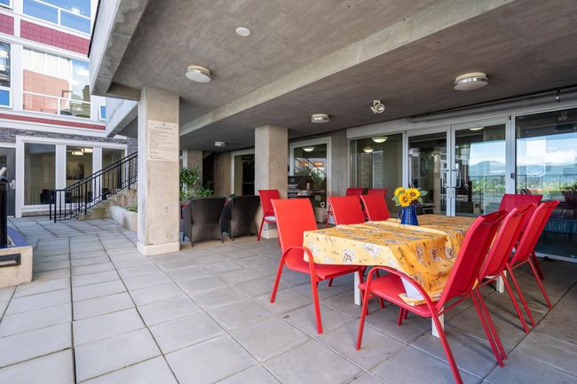 View of patio / terrace featuring stairs and outdoor dining area | Image 17