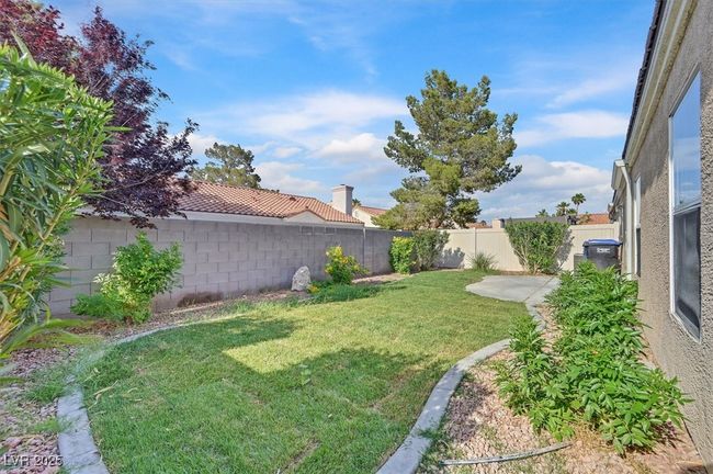 View of fenced backyard | Image 20