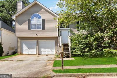 6396 Stonebridge Creek Lane, House other with 3 bedrooms, 2 bathrooms and 2 parking in Lithonia GA | Image 1