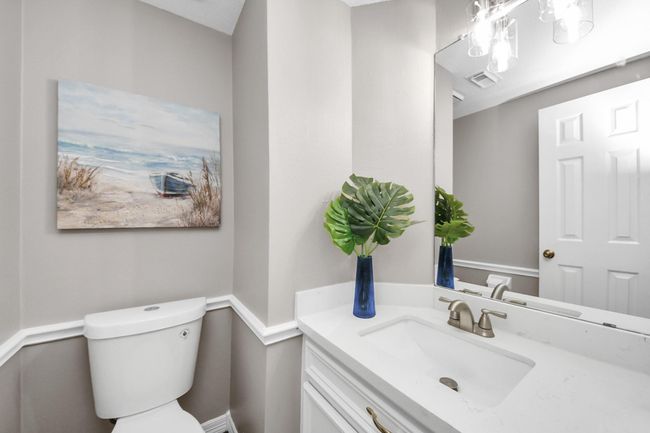 Half bath under stairway. | Image 17