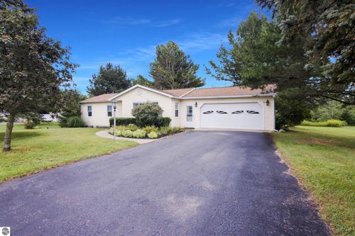 307 Lamoreaux Dr, Elk Rapids, MI, 49629-9737 | Card Image