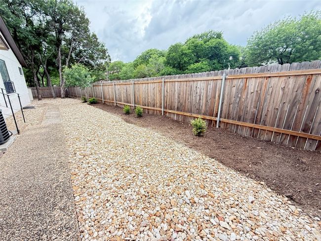Xeriscaped yard helps with the droughts in Central Texas with some areas left for your preferences | Image 30