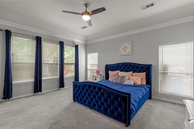Primary bedroom with plenty of natural light. | Image 23