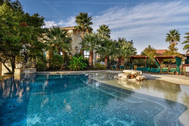 Community pool featuring a gazebo and outdoor lounge area | Image 20