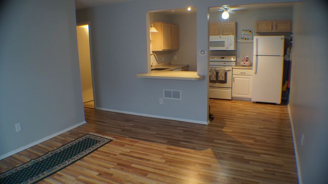 Living room open to kitchen & eat in area | Image 13