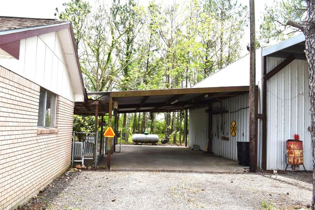 Easy access to the house under covered porch and carport when it rains | Image 5