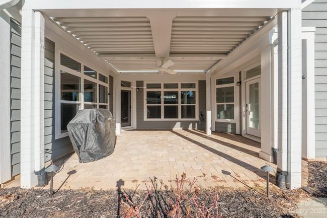 Patio with louvre system and gas grill for entertaining | Image 32