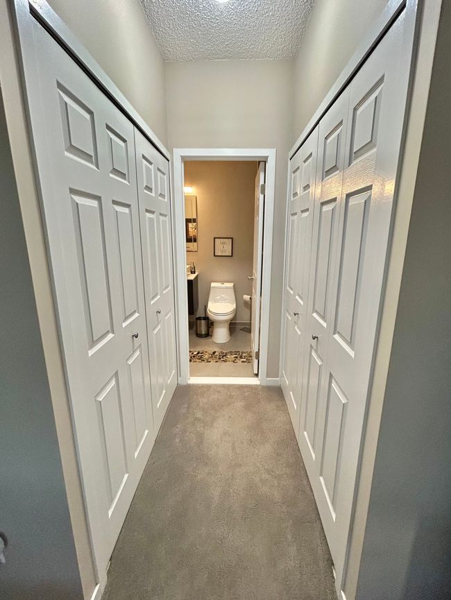Dual closets with access to remodeled bath | Image 22