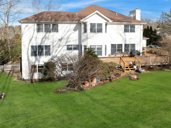 Back of property with a wooden deck and a lawn | Image 28
