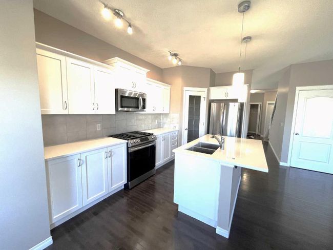 119 Kinlea Link Nw, Home with 6 bedrooms, 3 bathrooms and 4 parking in Calgary AB | Image 9