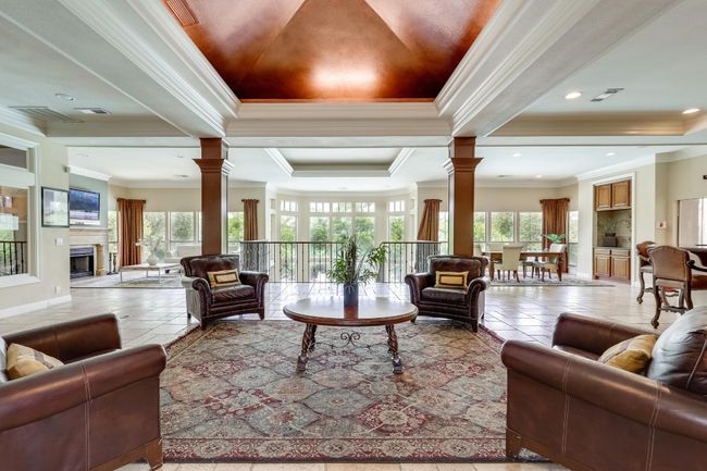 Lobby with ornamental molding and recessed lighting | Image 29