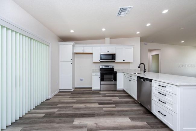 7230 Apache Trl, House other with 4 bedrooms, 2 bathrooms and null parking in SPRING HILL FL | Image 11