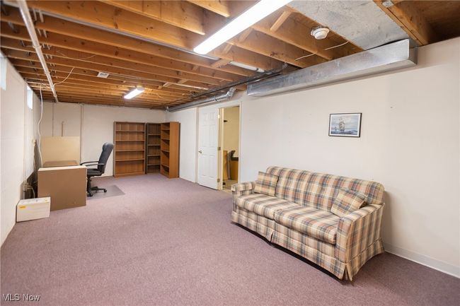WOW! You will love the recreation room and additional storage space! | Image 31