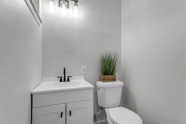 Half bath with toilet and vanity | Image 12