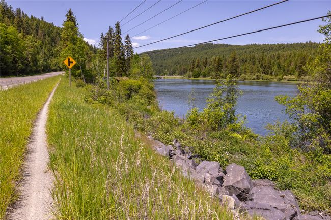 Water view featuring a forest | Image 114