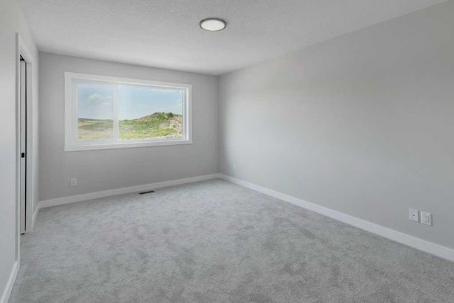 82 Edith Green Nw, Home with 4 bedrooms, 3 bathrooms and 2 parking in Calgary AB | Image 14