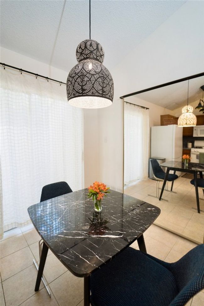 Dining area with custom lamp | Image 11