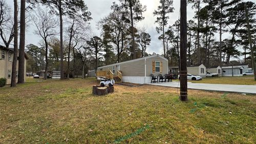 14348 W Ravine Run, Willis, TX, 77318-7414 | Card Image