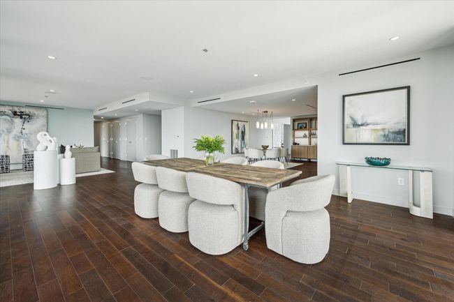Another view of the dining room, looking back toward the foyer, kitchen, and living room. | Image 11