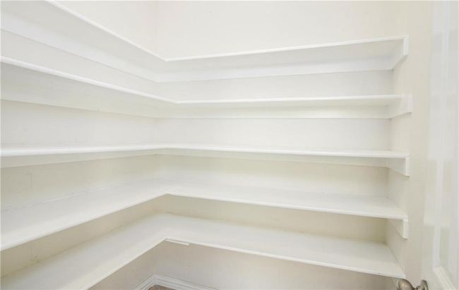 View of large pantry off kitchen area | Image 15