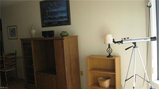 Telescope, small bookcase & pictures do not convey. | Image 12