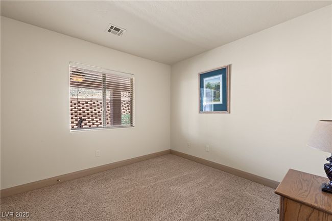 Empty room featuring baseboards and carpet | Image 28