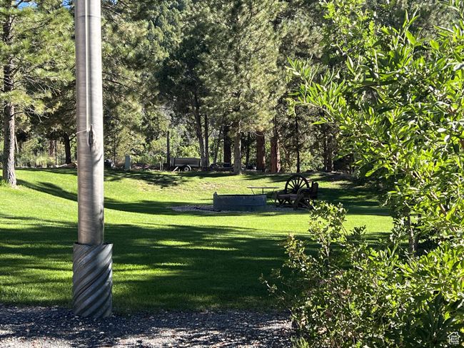 View of property's community with a lawn | Image 22
