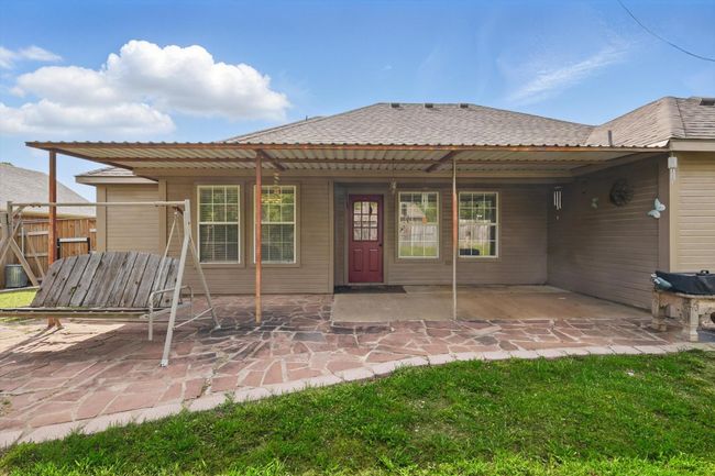 Back of house featuring fence and a patio | Image 32