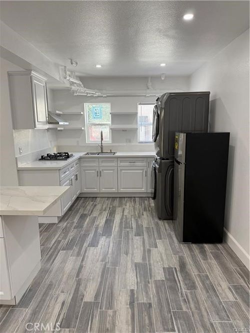 b-3302 Olive St, Huntington Park, CA, 90255-6418 | Card Image