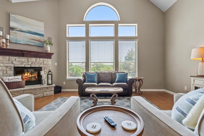 Enjoy effortless flow from casual meals to formal gatherings in this well-designed dining space beneath graceful architectural arches. | Image 8