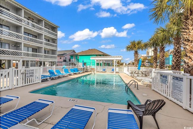 Pool featuring a patio and fence | Image 4