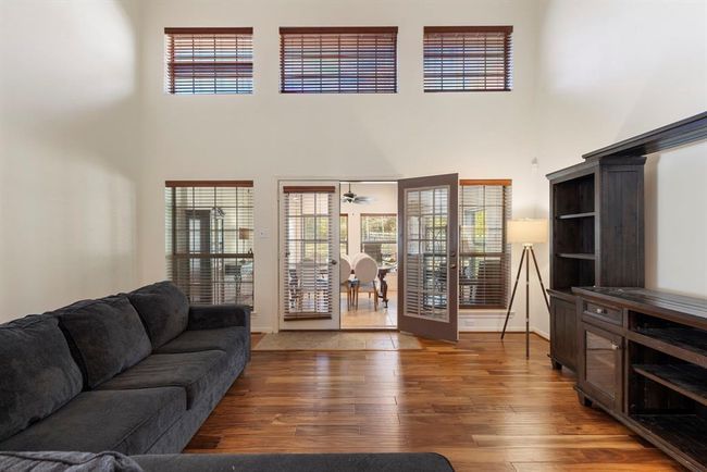 Living room with high ceilings. | Image 8